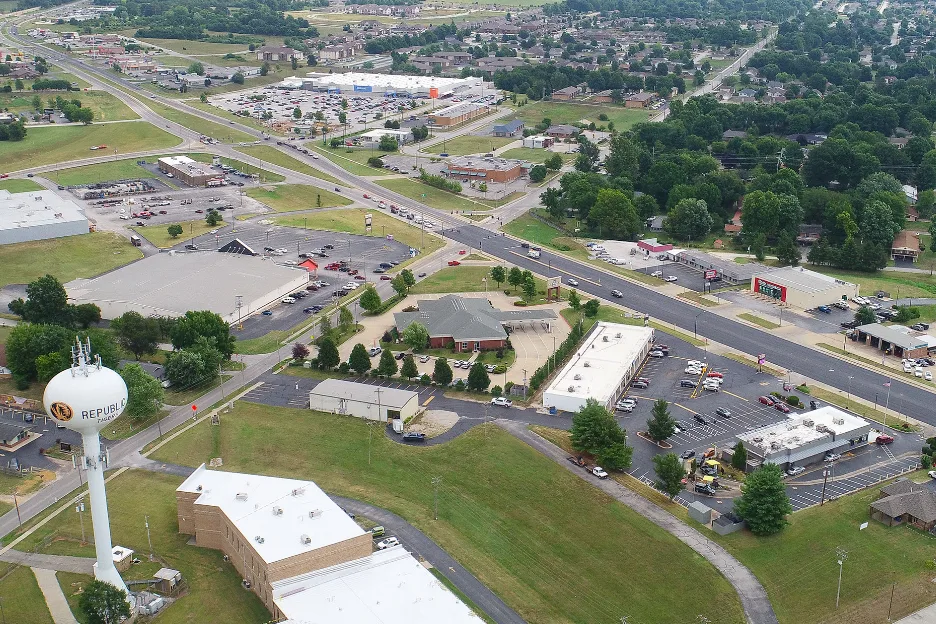 Aerial view of Republic, MO with its water tower and surrounding neighborhoods