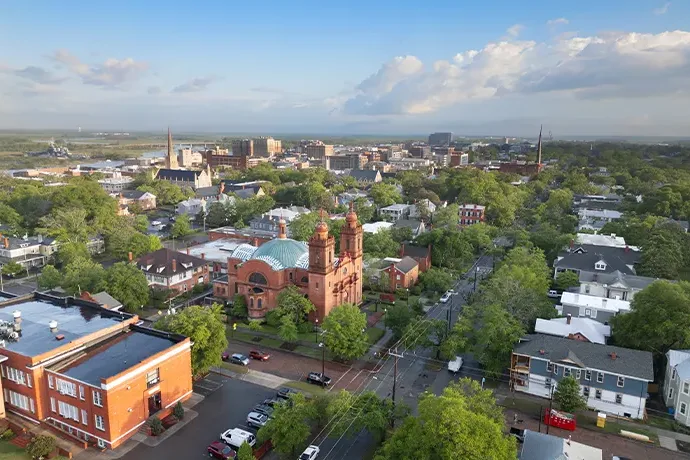 Aerial view of brick buildings and tree-lined streets in Strafford, MO